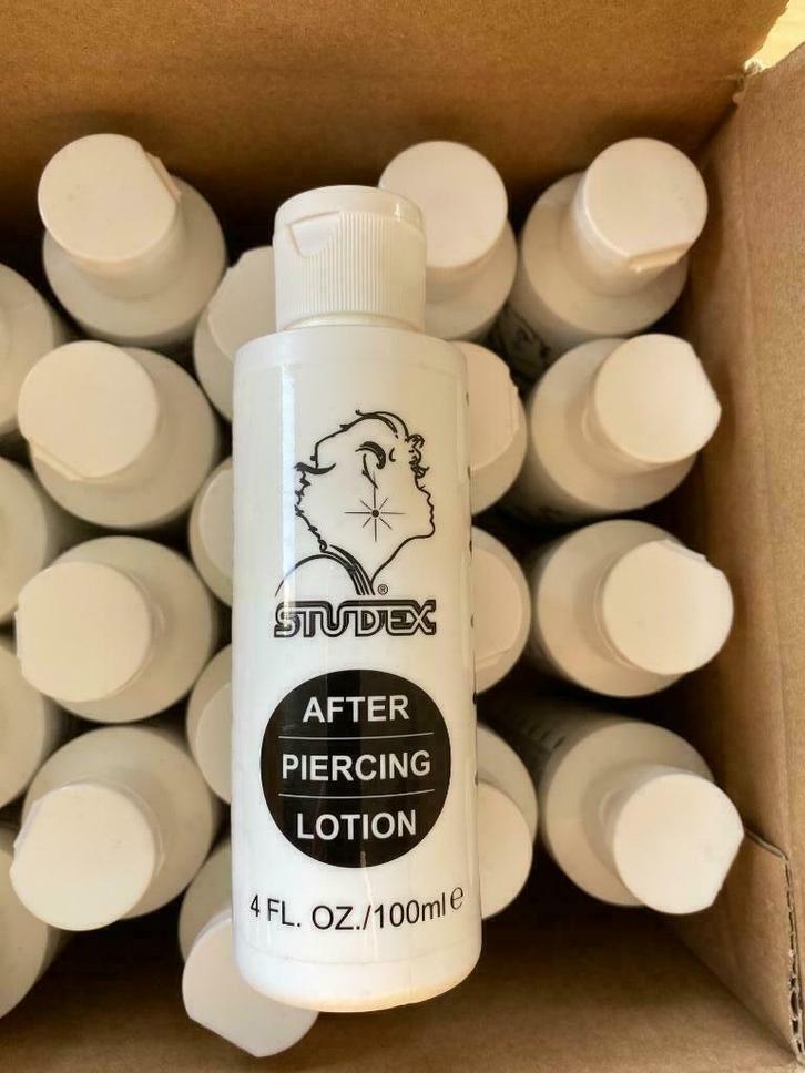 Studex after piercing lotion - 100ml (24x100ml), Bijoux, Sacs & Beauté, Beauté | Soins du corps, Neuf, Autres types, Enlèvement ou Envoi