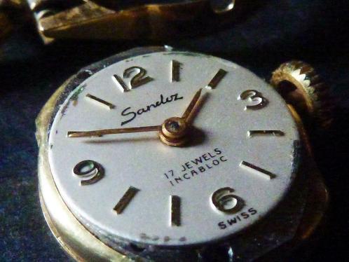 17 old Rubis Jewels Goud 18K SANDOZ Swiss made, Handtassen en Accessoires, Horloges | Antiek, Polshorloge, Overige merken, Goud