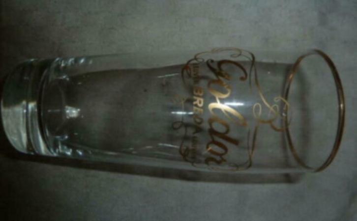 #J bier glas GOLDOR Brij Breda - Leuven Louvain " glad glas, Verzamelen, Glas en Drinkglazen, Gebruikt, Bierglas, Ophalen of Verzenden