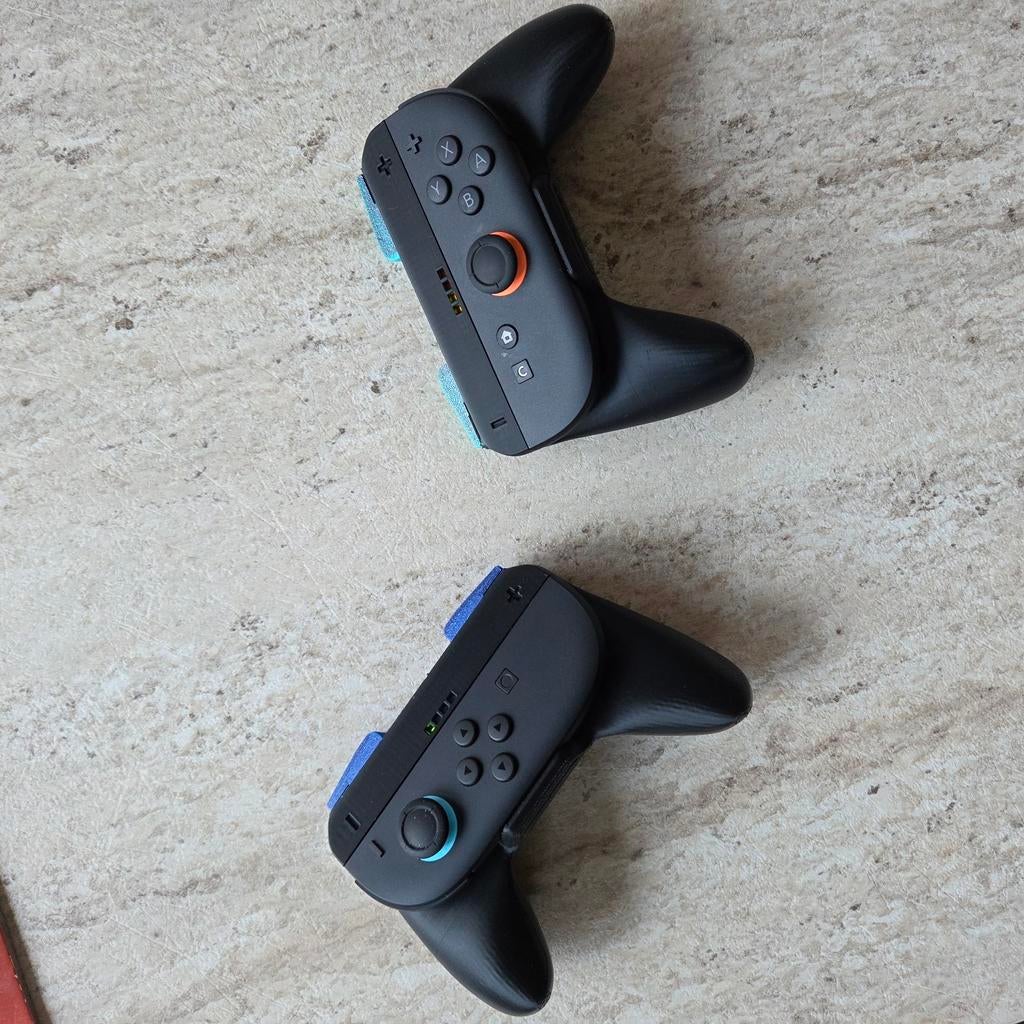 Nintendo switch 2 joy con houder ergonomisch, Games en Spelcomputers, Ophalen of Verzenden, Nieuw, Switch, Overige controllers