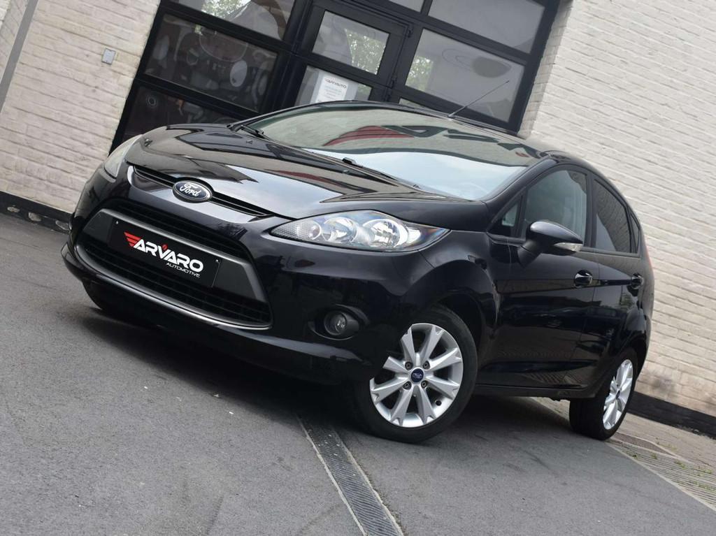 Ford Fiesta 1.25i Titanium / Airco / Verw Zetels / Alu Velg, Voorwielaandrijving, Euro 5, Stof, Gebruikt