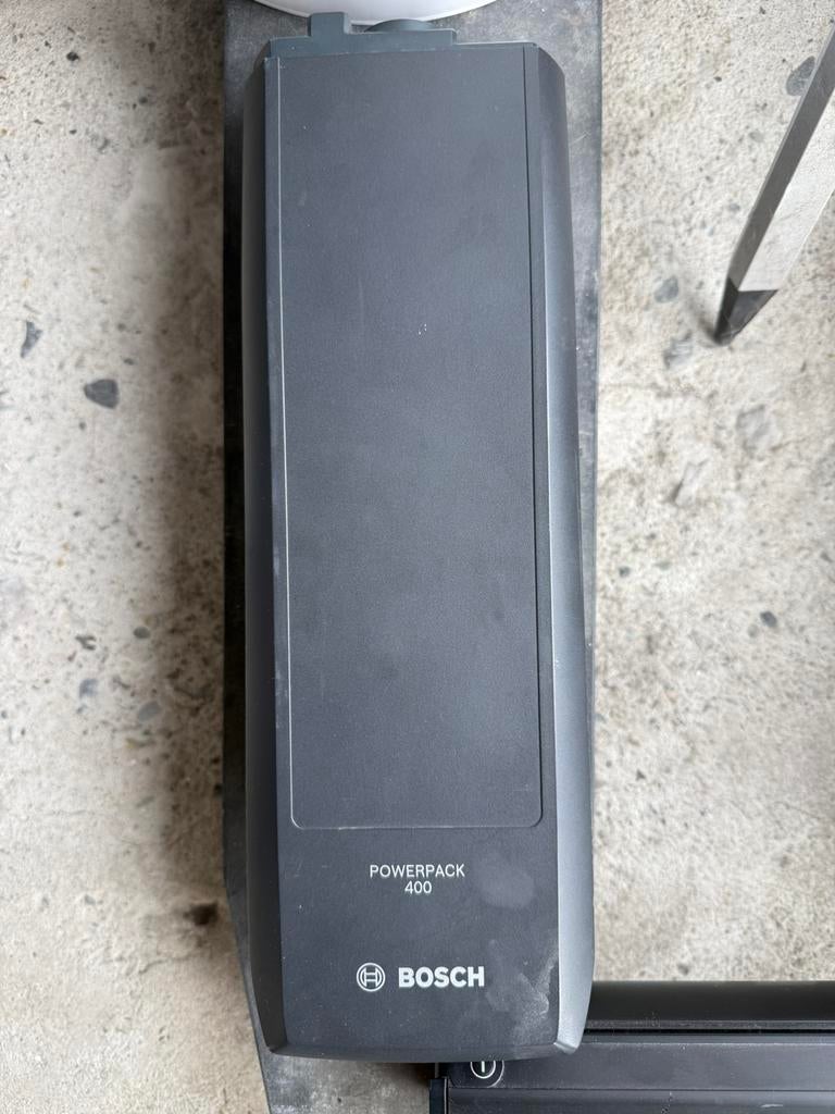Defecte Bosch pakdrager + powertube batterij, Fietsen en Brommers, Ophalen, Gebruikt