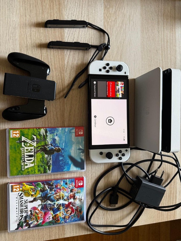 Console Nintendo Switch v 1 en parfait état à vendre, Met games, Ophalen of Verzenden, Zo goed als nieuw, Switch Original