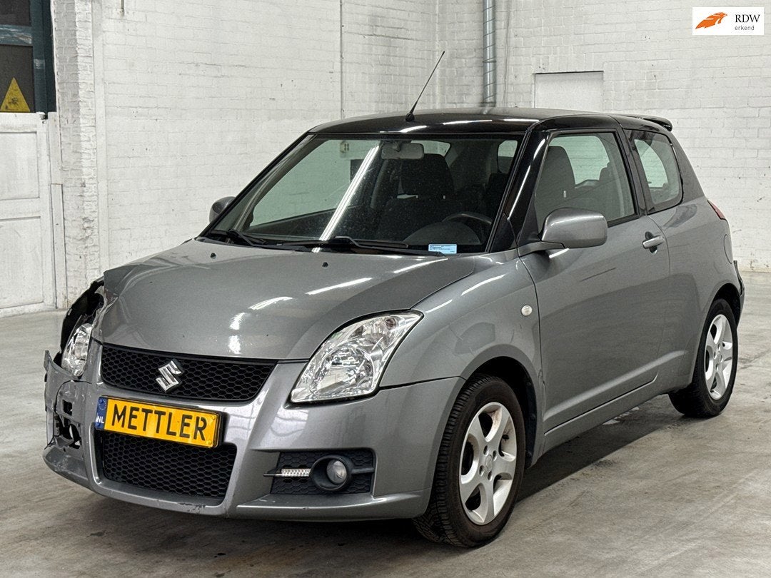 Suzuki Swift 1.3 Comfort | Schadevoertuig, Autos, Suzuki, 945 kg, Argent ou Gris, Achat, 140 g/km