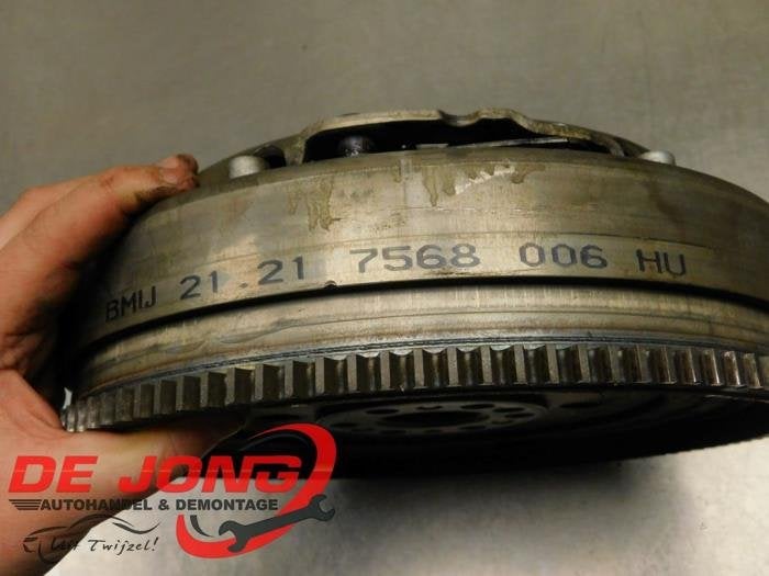 Volant d'inertie masse double d'un BMW 1-Serie, -, 3 mois de garantie, Utilisé, -
