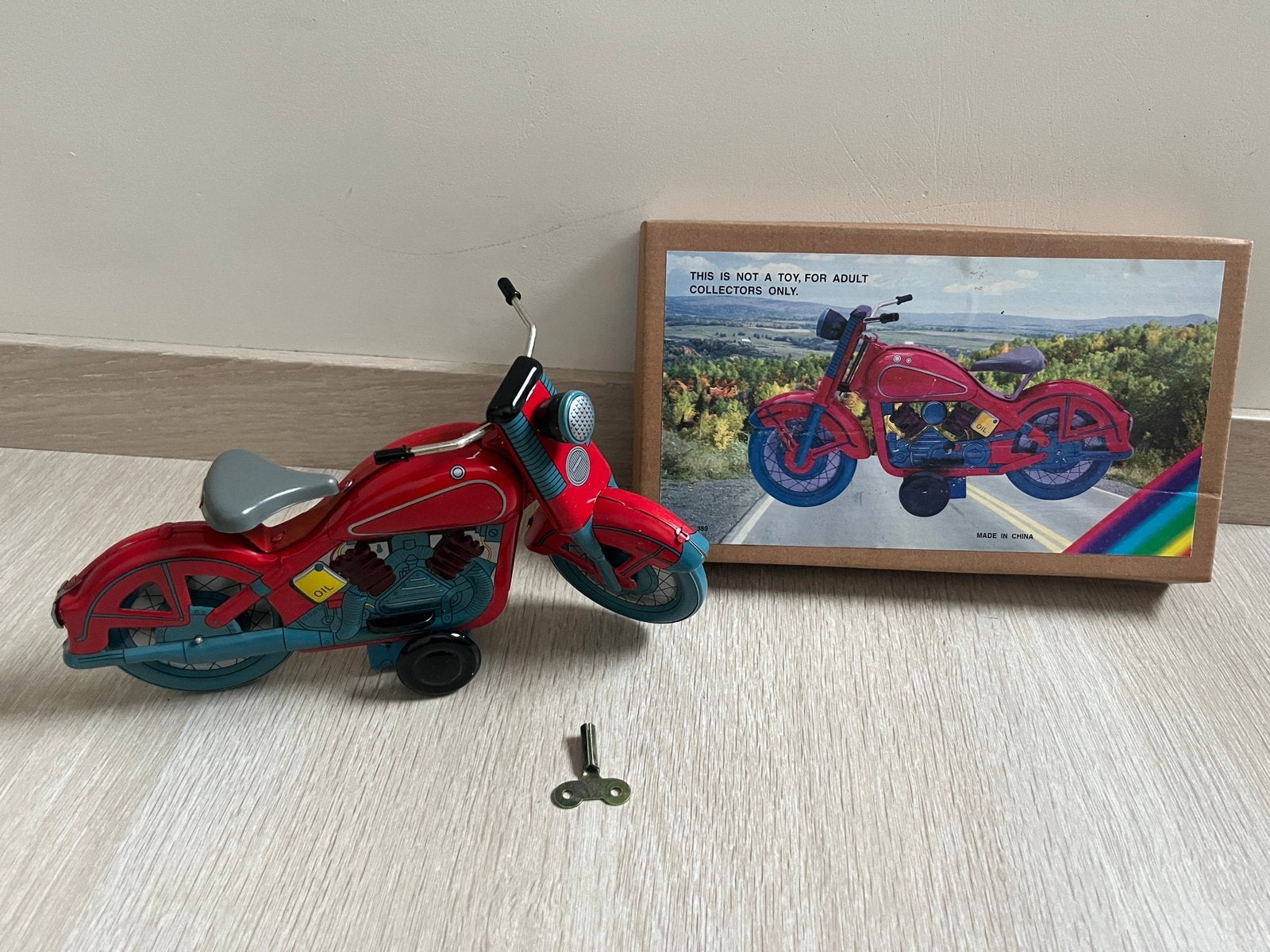 Model moto in tin met frictie, Antiek en Kunst, Antiek | Speelgoed, Ophalen of Verzenden