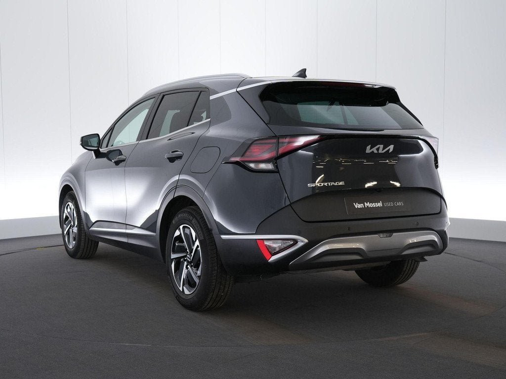 Kia Sportage 1.6 T-GDi 48V 7DCT Pulse, Auto's, Stof, Gebruikt, 4 cilinders, 1650 kg