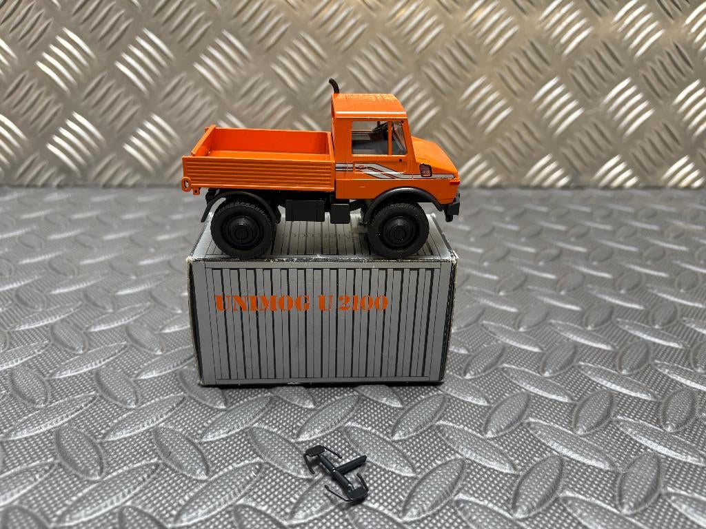 UNIMOG U 2100 Oranje - CURSOR - 1/50, Verzenden, Nieuw, Bus of Vrachtwagen, Overige merken