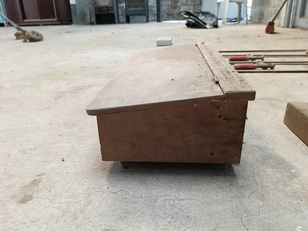 Houten bureau, Ophalen