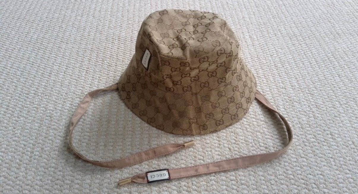 Beige/roze omkeerbare Gucci-vissershoed, Ophalen of Verzenden, Zo goed als nieuw, Beige