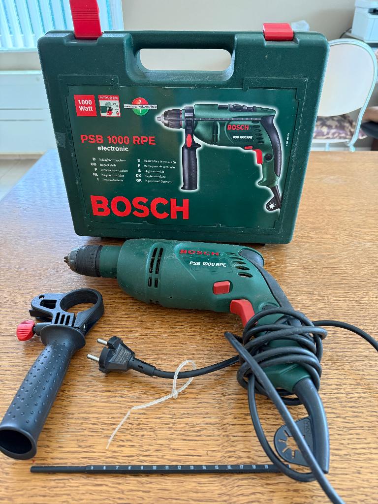 Perceuse à percussion Bosch PSB 1000 RPE 1000W + étui, Bricolage & Construction, 600 watts ou plus, Enlèvement ou Envoi, Utilisé