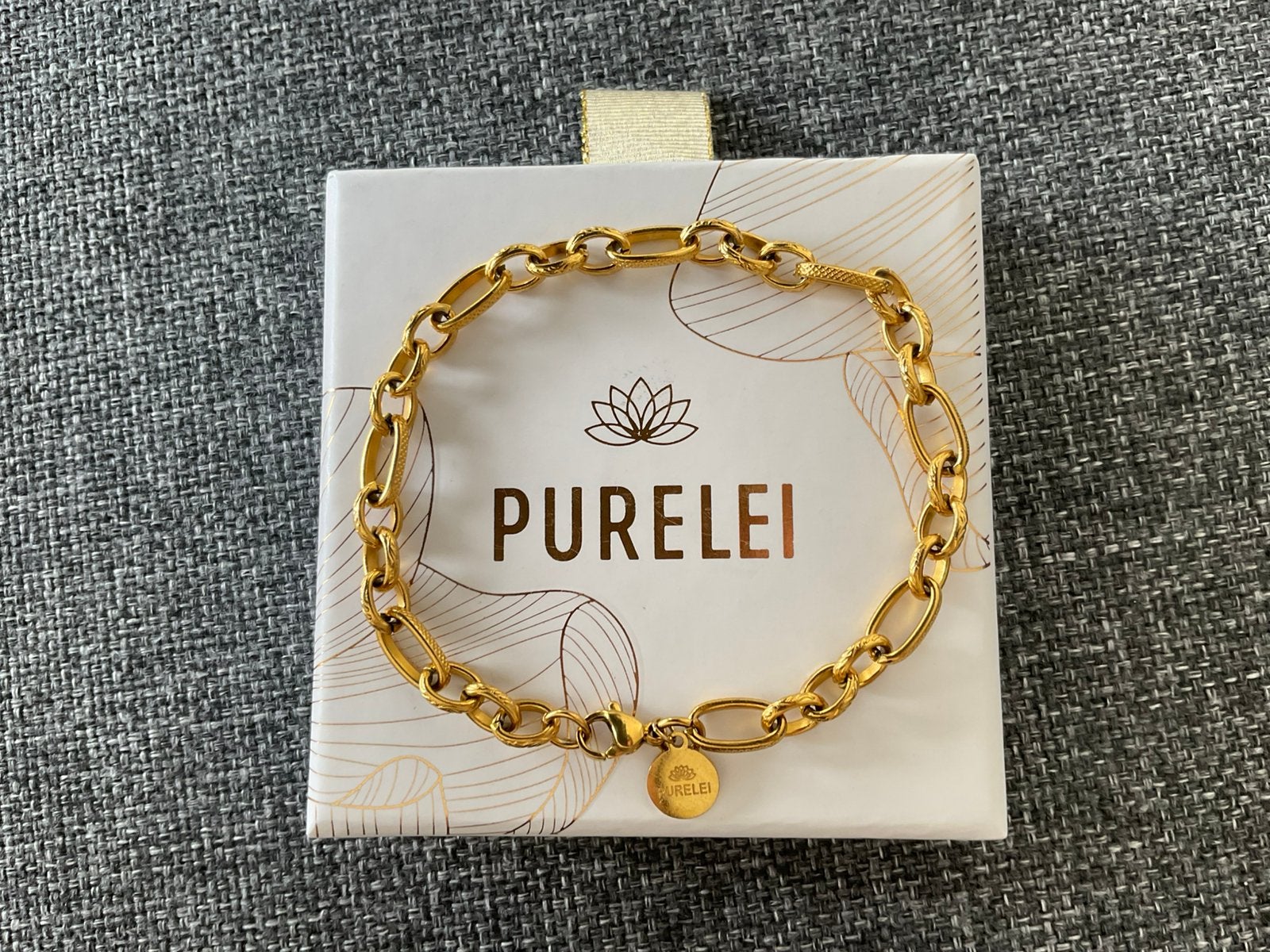 Armband Purelei, Handtassen en Accessoires, Armbanden, Ophalen of Verzenden, Nieuw, Goud, Staal
