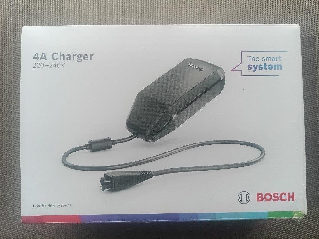 Bosch oplader 4A, Fietsen en Brommers, Zo goed als nieuw