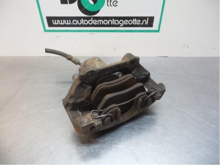 Etrier de frein (pince) avant gauche d'un Volkswagen Golf (G, Autos : Pièces & Accessoires, Volkswagen, -, 3 mois de garantie