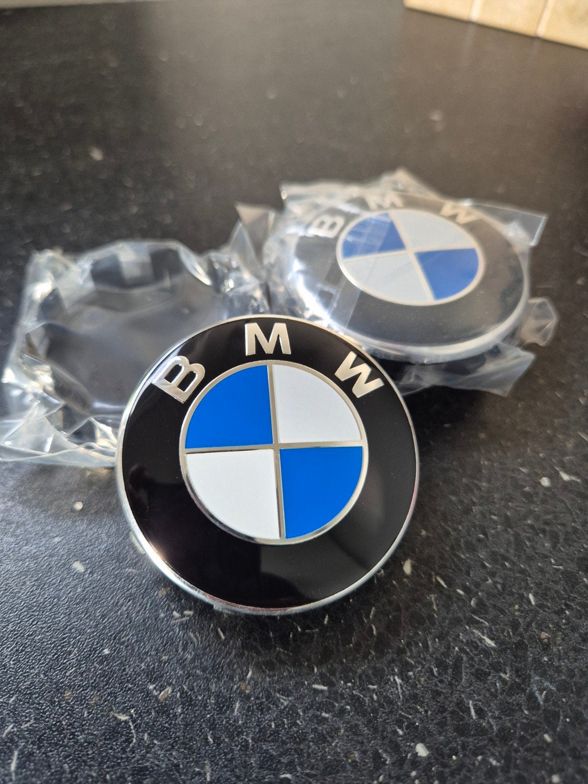 BMW centercaps velgen embleem 56mm, Enlèvement