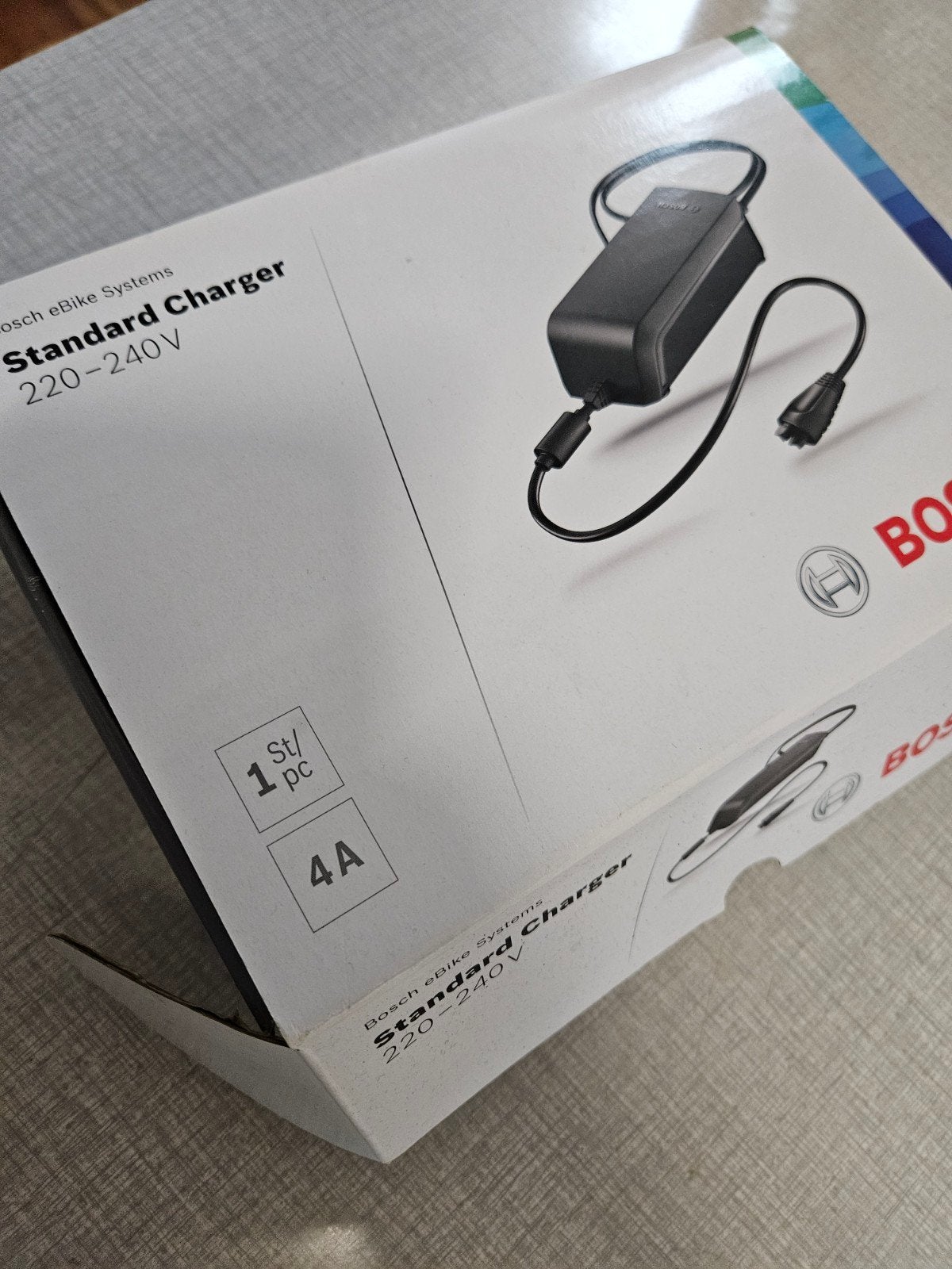 Bosch fiets oplader 4A, Fietsen en Brommers