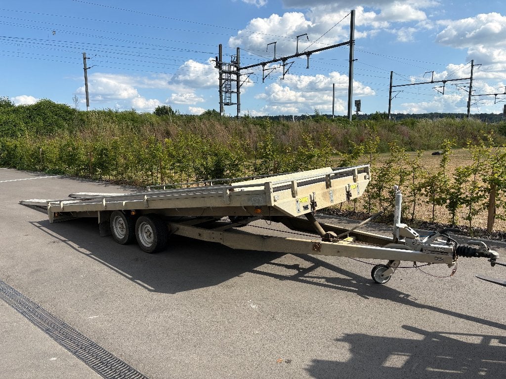 Platte aanhangwagen, Ophalen, Gebruikt