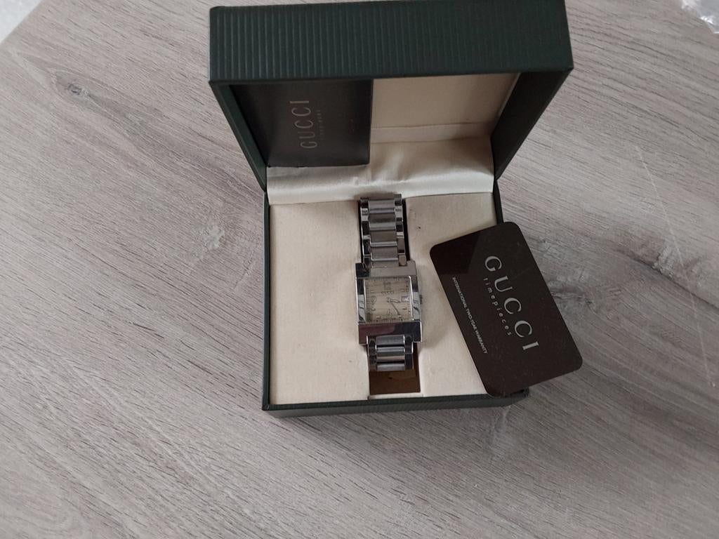 heren horloge GUCCI, Ophalen