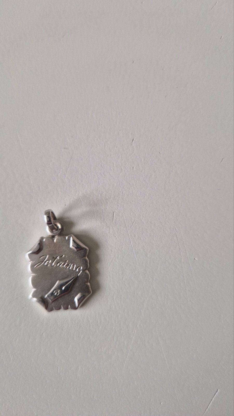 pendentif en argent, Enlèvement, Argent