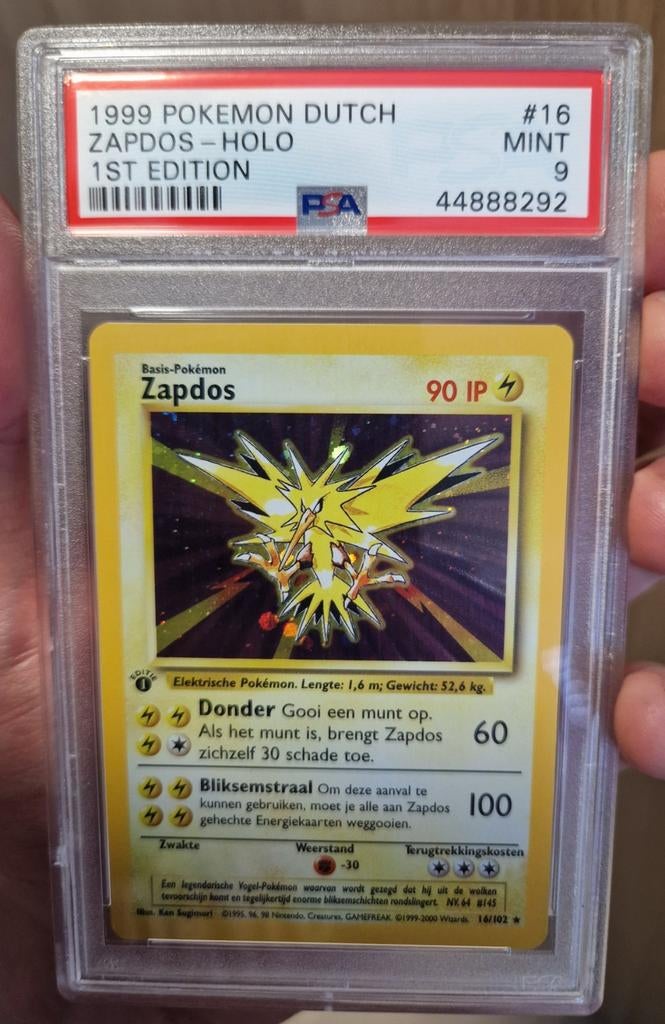 PSA 9 Zapdos 1st edition 1ste editie Base Set Dutch NL, Ophalen of Verzenden, Nieuw, Losse kaart, Foil