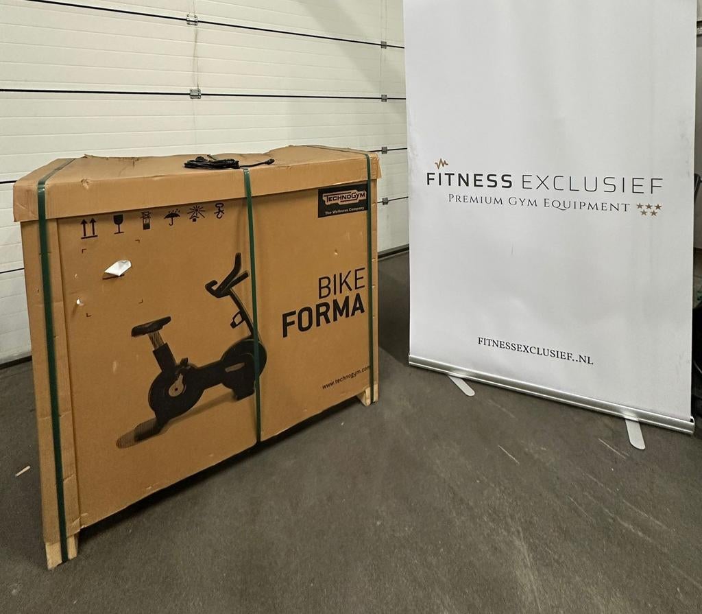 2x Technogym New Bike Forma Excite+ LED – 1x Nieuw – 1x Gebr, Sport en Fitness, Fitnessmaterialen, Ophalen, Nieuw, Benen, Overige typen