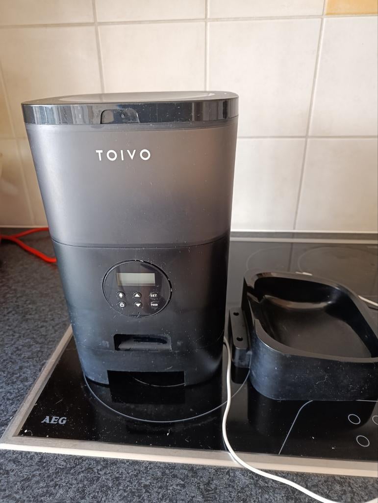 Automatische voederbak voor katten of kleine hondjes, Ophalen