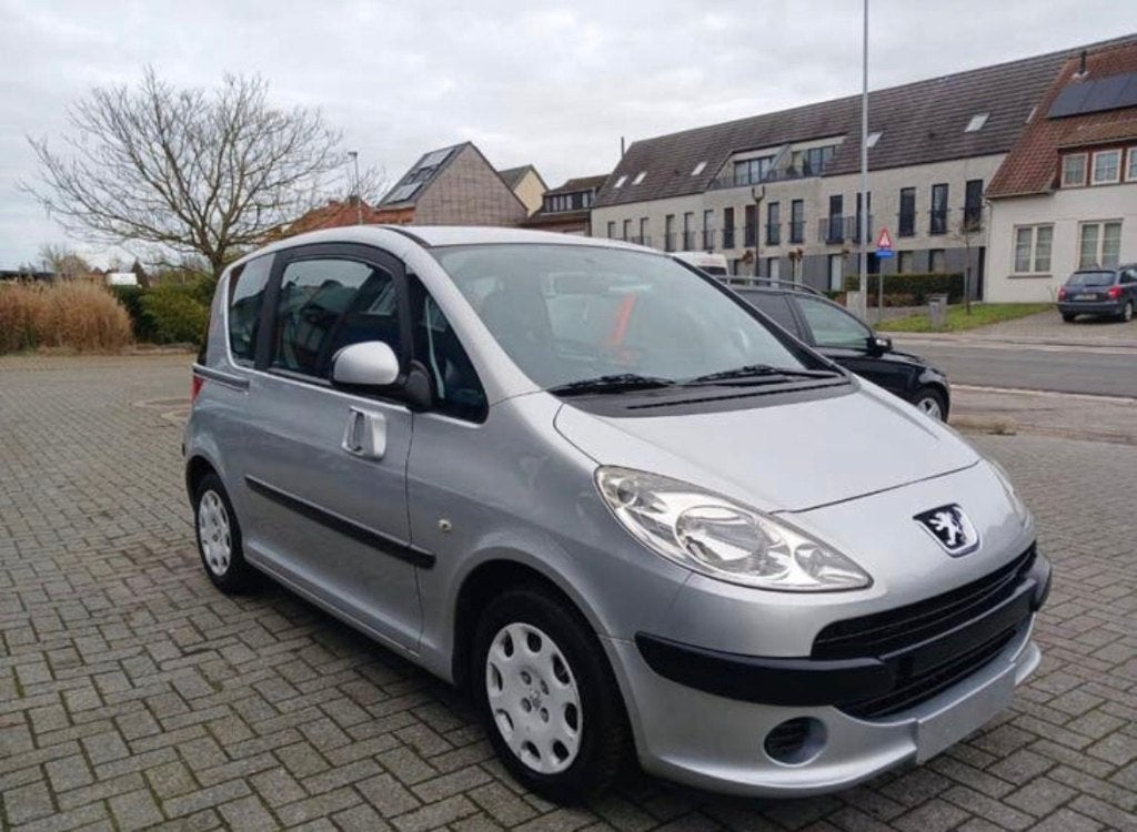 Peugeot 1007 – 1.6 Benzine Bj 2009 119000km Direct Rijklaar, Auto's, Peugeot, Stof, 1600 cc, Bedrijf, Grijs
