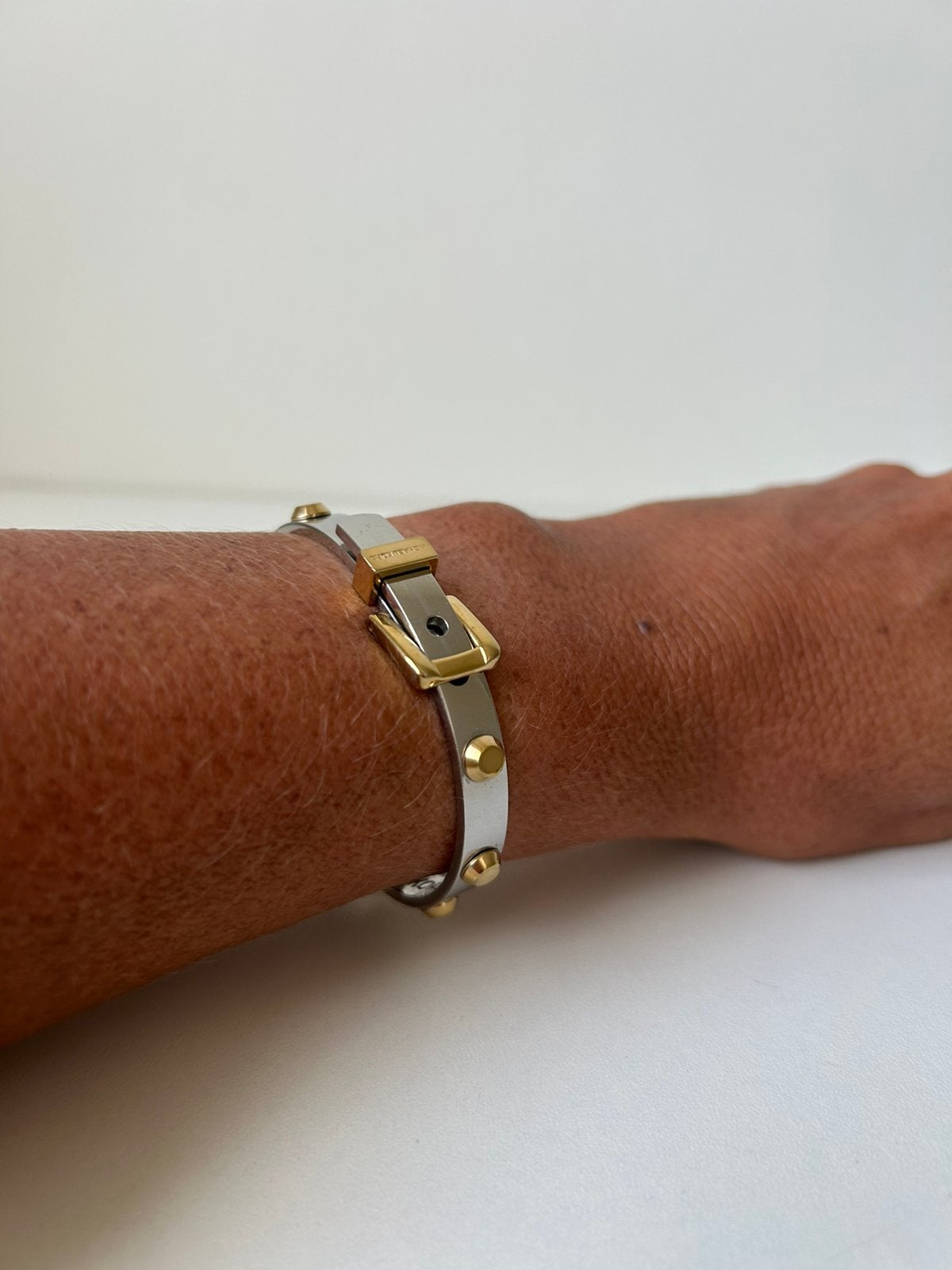 Zilver/goud kleurige armband van Michael Kors., Ophalen of Verzenden, Zo goed als nieuw, Goud