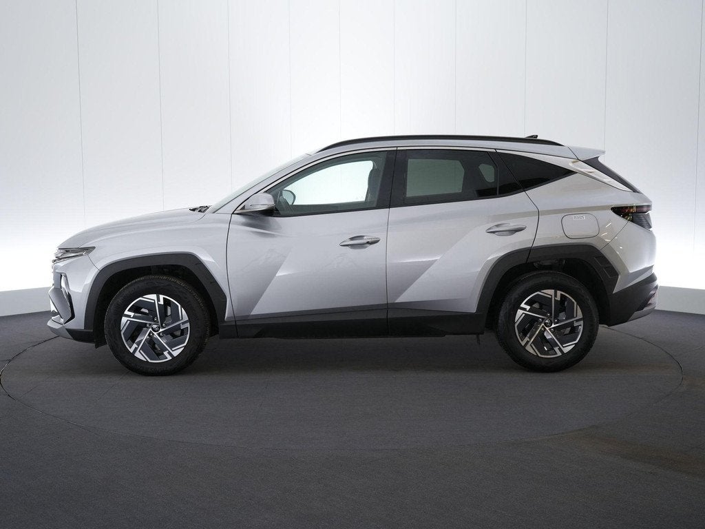 Hyundai Tucson 1.6 T-GDi 48V Feel 7-DCT, Stof, Gebruikt, 4 cilinders, 1600 cc