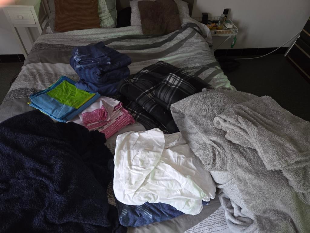 Pakket dekbedovertrekken en hoeslakens, Ophalen