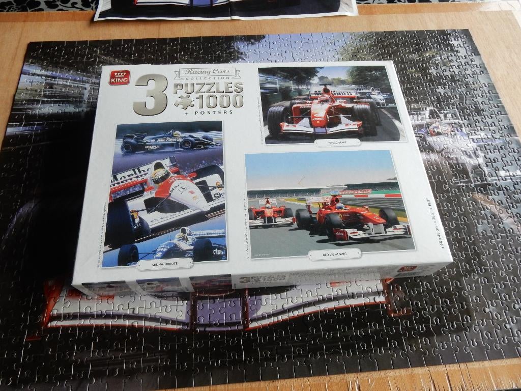 nr.56 - Puzzels: racing cars - 3 x 1000 stukjes, Hobby en Vrije tijd, Ophalen of Verzenden, 500 t/m 1500 stukjes, Zo goed als nieuw