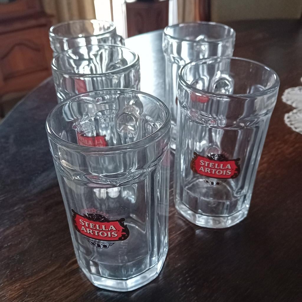 4 geribberde glazen bierpotten met oor stella artois 25cl, Ophalen