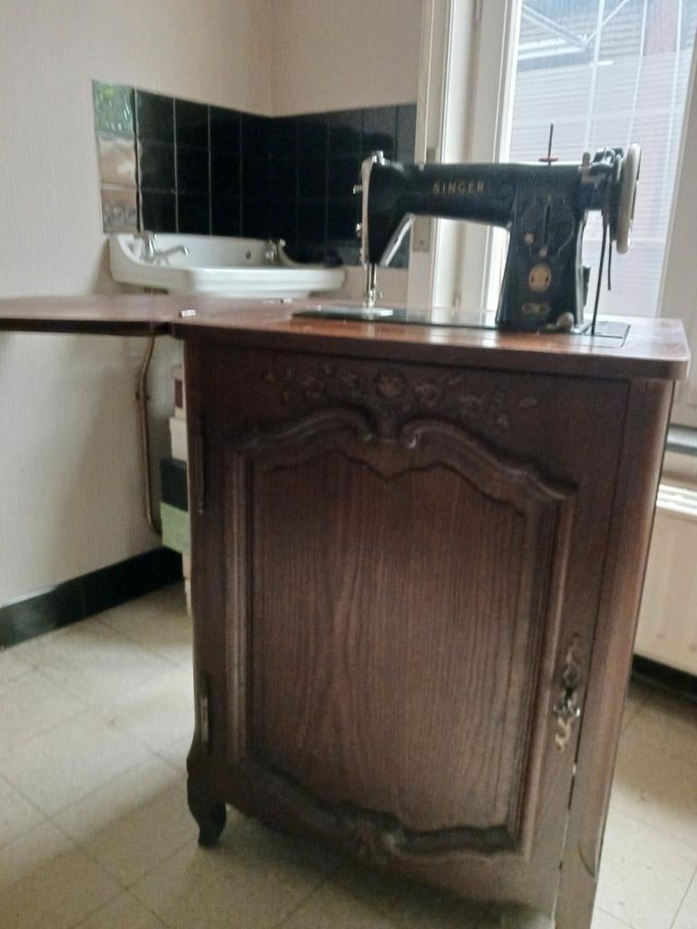 Oud Singer naaimachine, Ophalen