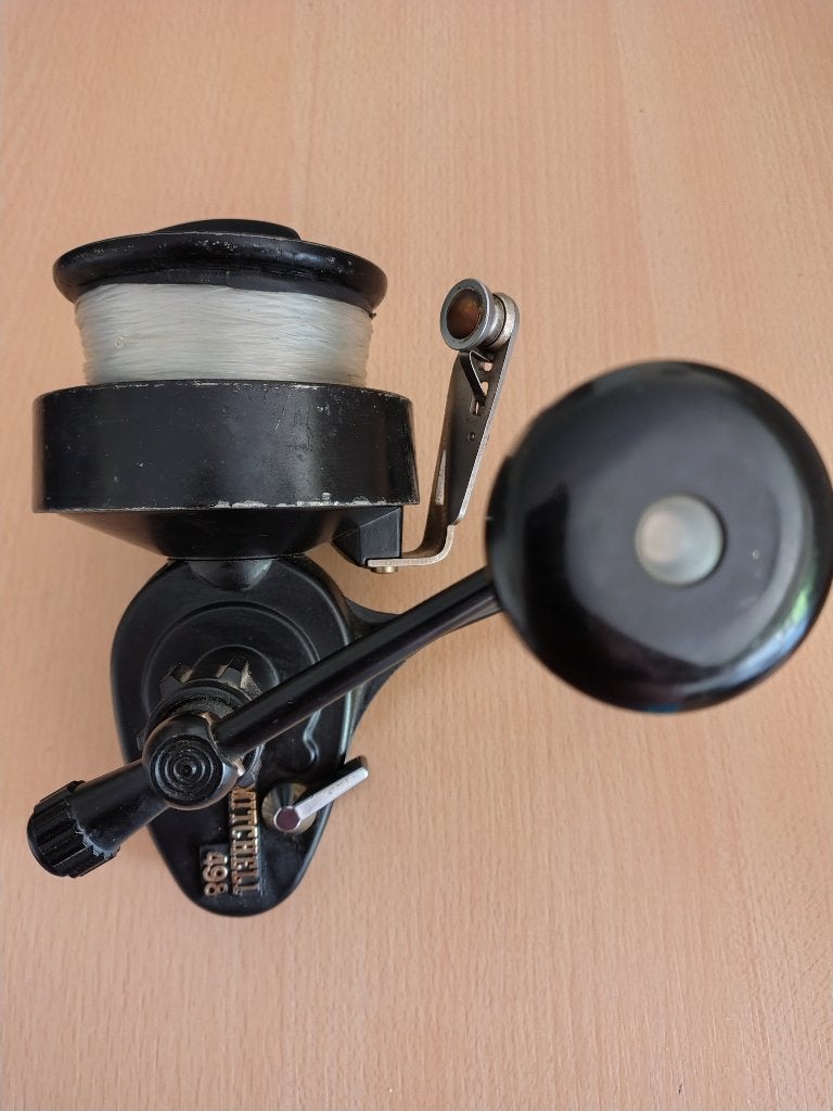 2 MOLENS MITCHELL 498, Enlèvement ou Envoi, Comme neuf, Moulinet