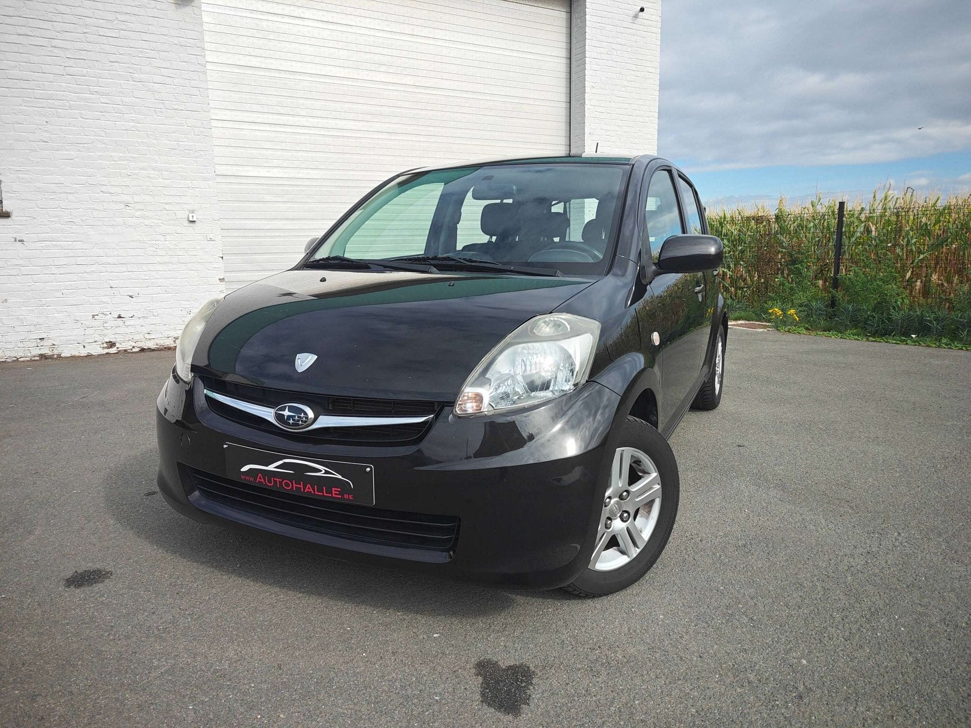 Subaru Justy Justy 1.0i Comfort benzine/essence - AIRCO - 5, Auto's, Stof, Gebruikt, 965 kg, Zwart