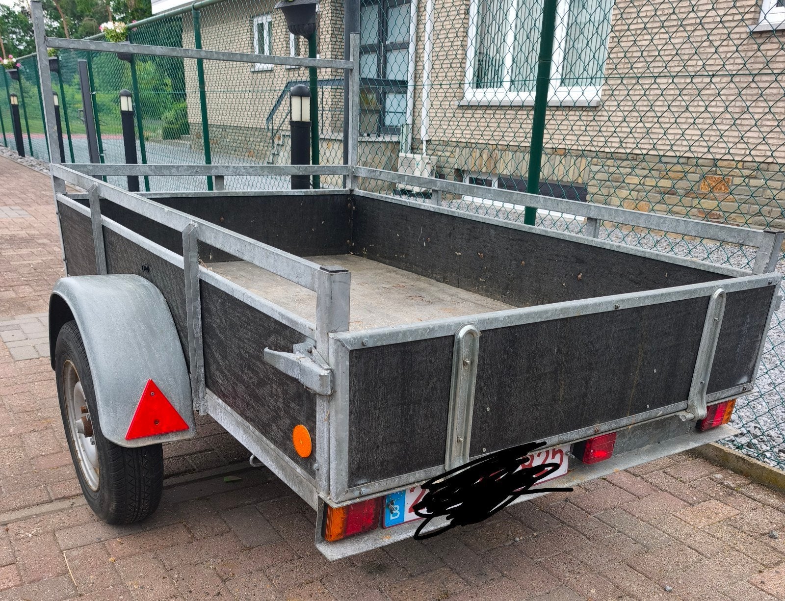 Aanhangwagen enkelasser, Ophalen