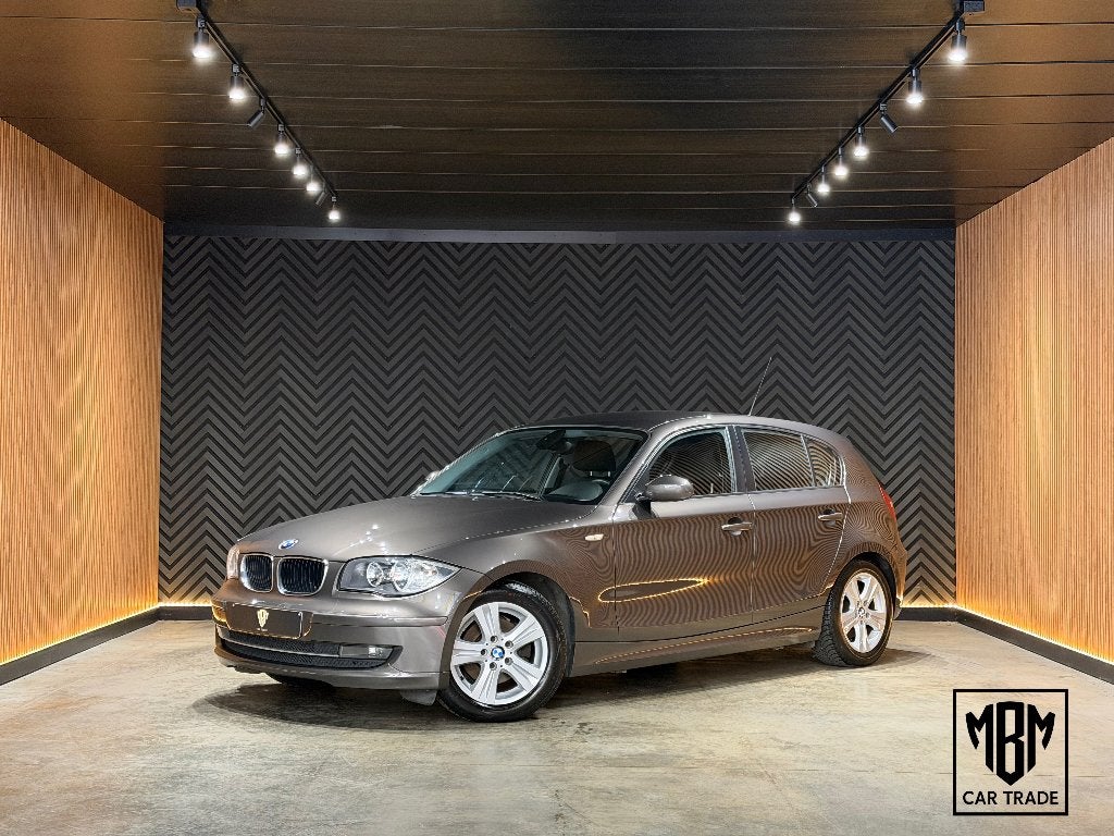 ✅BMW 118 d GARANTIE Airco Cruise C Parksensoren LCI Facelift, 1995 cc, Zwart, 4 cilinders, Bruin