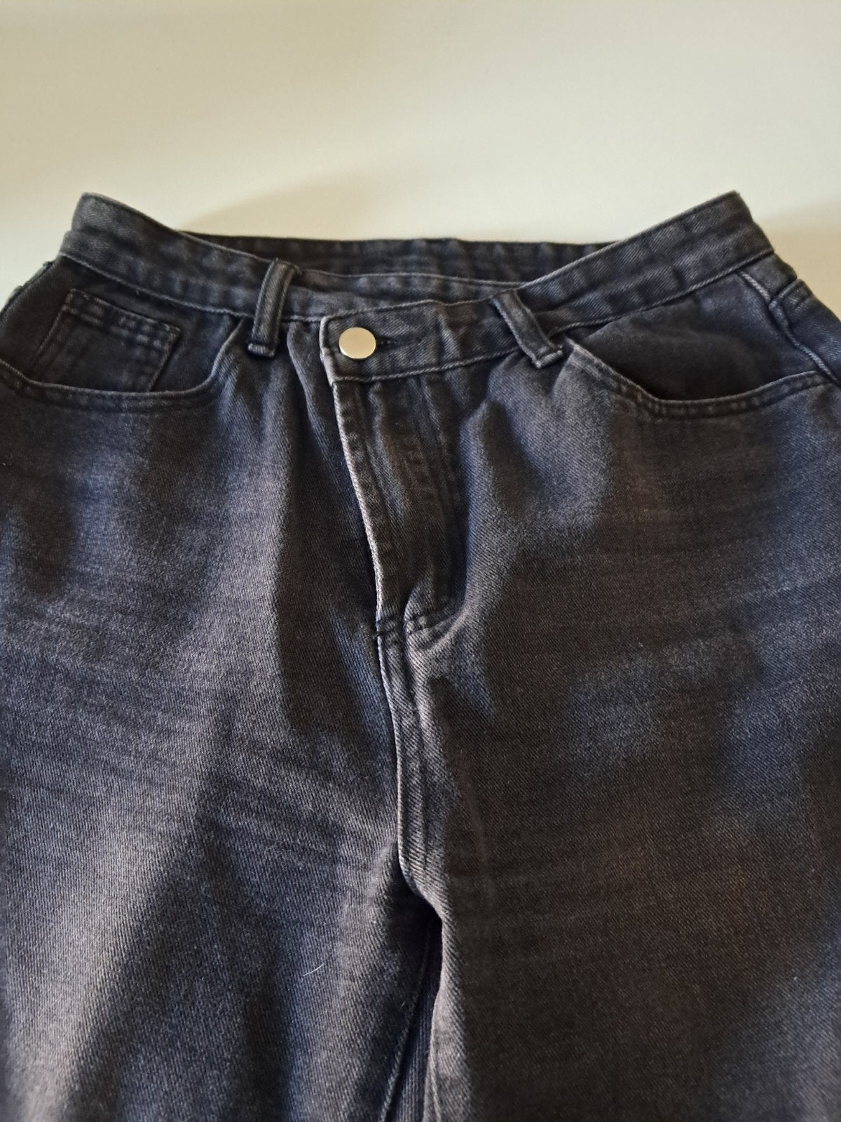 zwarte broek medium, Ophalen