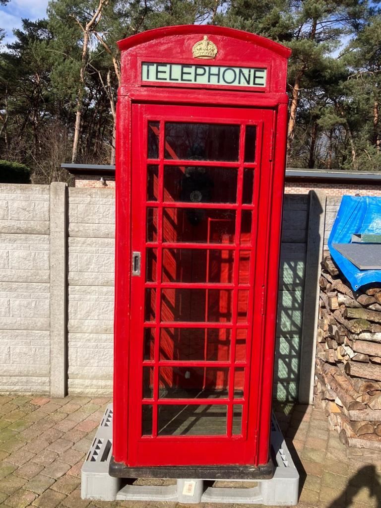 Originele rode telefooncel, Ophalen