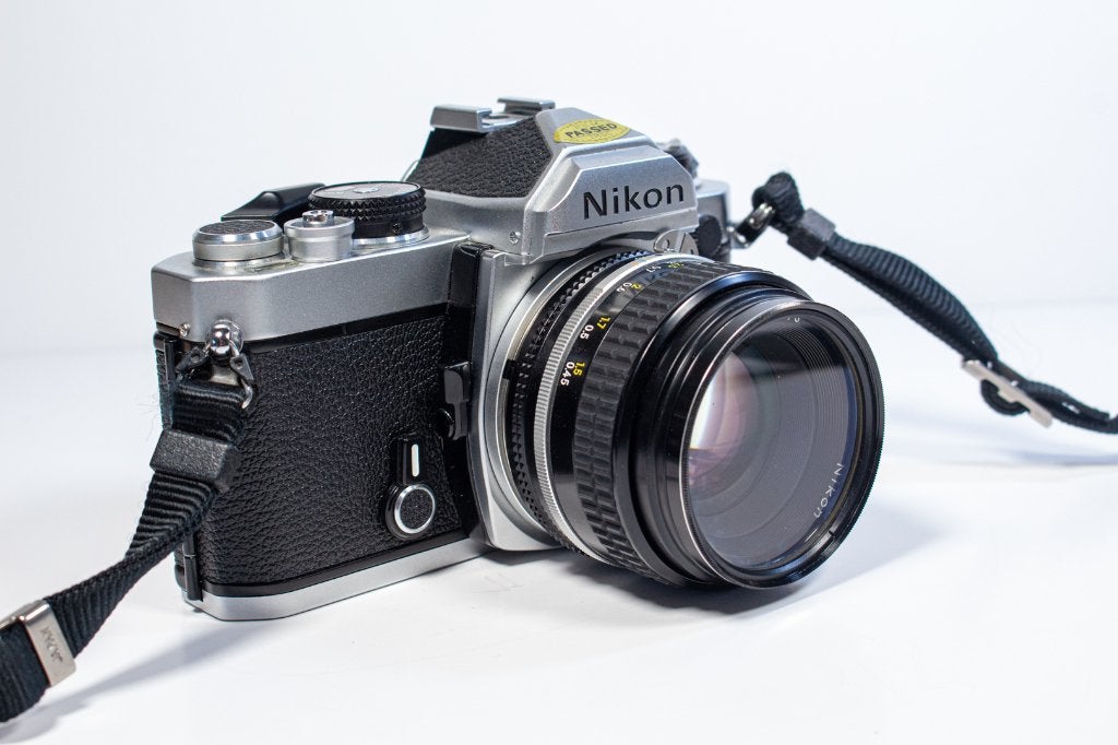 Nikon fm +nikkor 50mm f1.8 ARGENTIQUE, Audio, Tv en Foto, Fotocamera's Analoog, Ophalen, Zo goed als nieuw, Spiegelreflex, Nikon