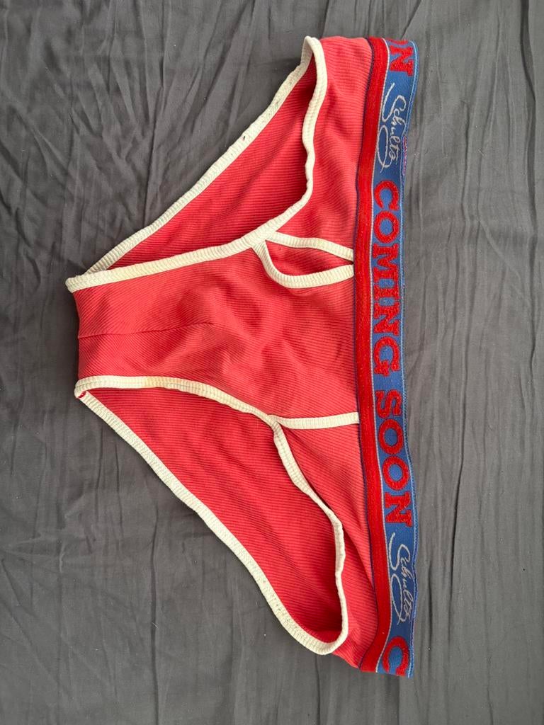 Slip M, Enlèvement, Slip
