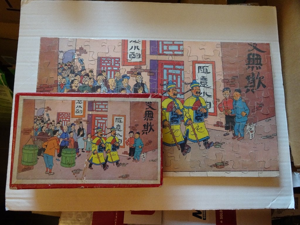 Puzzle 112 pièces en bois Tintin - Dupond(t) en mandarins, Collections, Envoi, Tintin, Utilisé, Livre ou Jeu