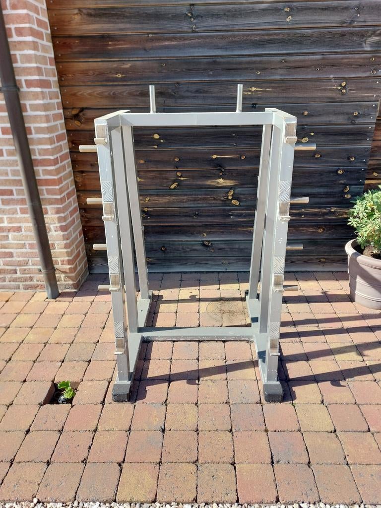 Opbergrek voor halterstangen en schijven., Sport en Fitness, Ophalen, Gebruikt, Halterschijven
