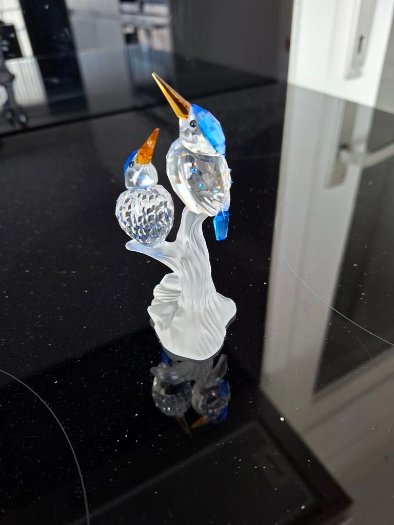 Swarovski ijsvogels, Ophalen