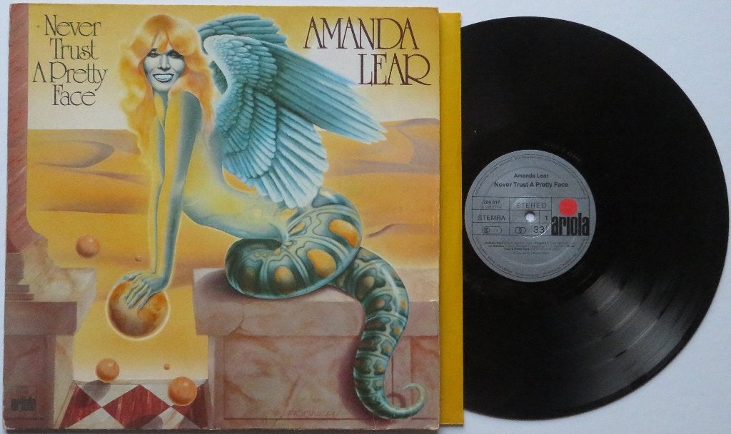 Amanda Lear - Never trust a pretty face. Lp, Cd's en Dvd's, Vinyl | Dance en House, LP, Gebruikt, Inclusief binnenhoes, Ophalen of Verzenden