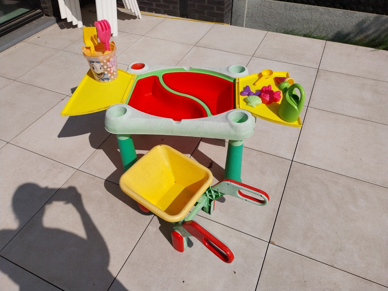 buitenspeelgoed zandtafel, Ophalen