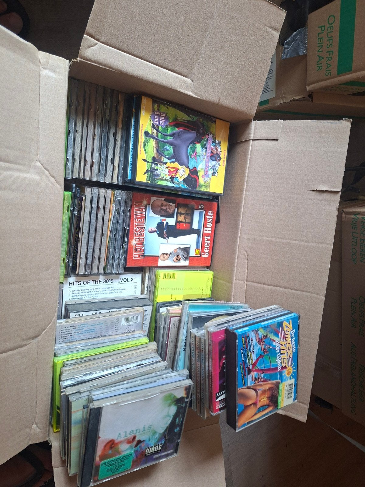 Volledige doos met cd's en dvd's, Ophalen of Verzenden
