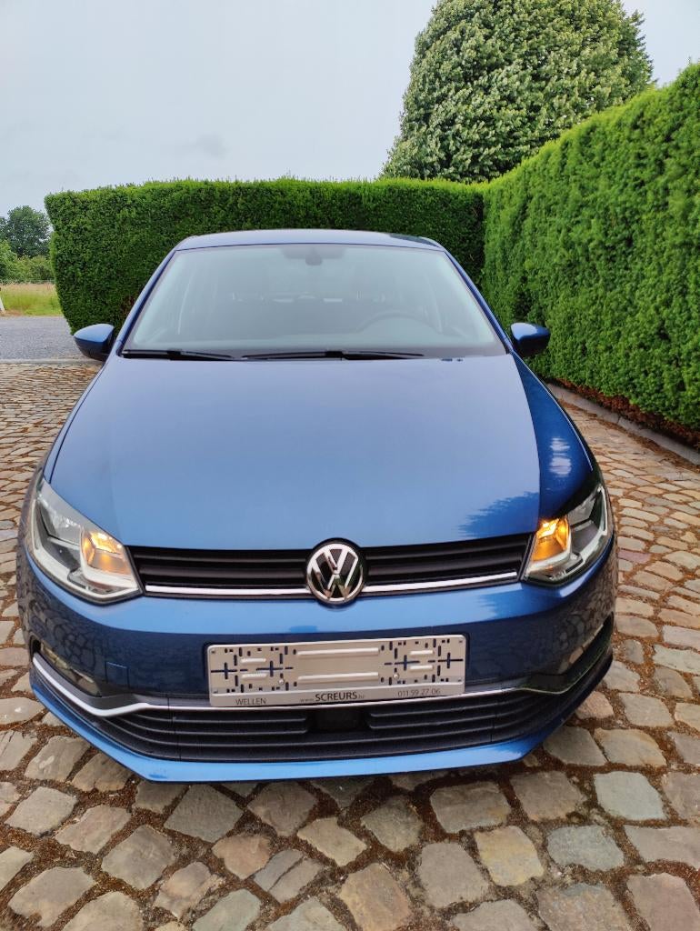 Volkswagen Polo 1.2 TSI Comfortline BMT, Auto's, Voorwielaandrijving, Stof, 4 cilinders, Blauw