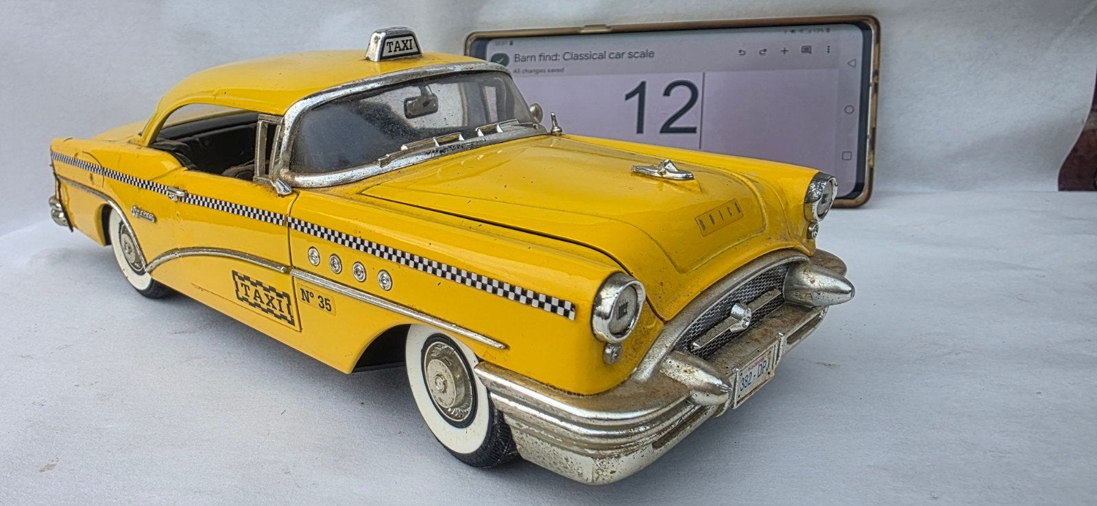 N° 12 — Buick Century Taxi 1955 — MIRA, Hobby & Loisirs créatifs, Voitures miniatures | 1:18, Enlèvement ou Envoi, Utilisé, Voiture