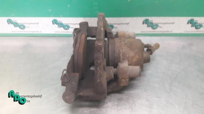 Etrier de frein (pince) avant gauche d'un Ford Focus (Focus, -, 3 mois de garantie, -, -